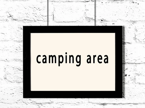 Black Wooden Frame Inscription Camping Area Hanging White Brick Wall — Stock Photo, Image