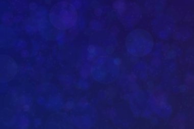 Bokeh ile soyut bir arkaplan. Yumuşak ışık odaklı noktalar.