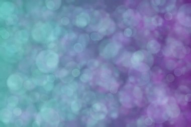 mor ve yeşil soyut çözünmüş arkaplan, daire şeklinde bokeh desen.