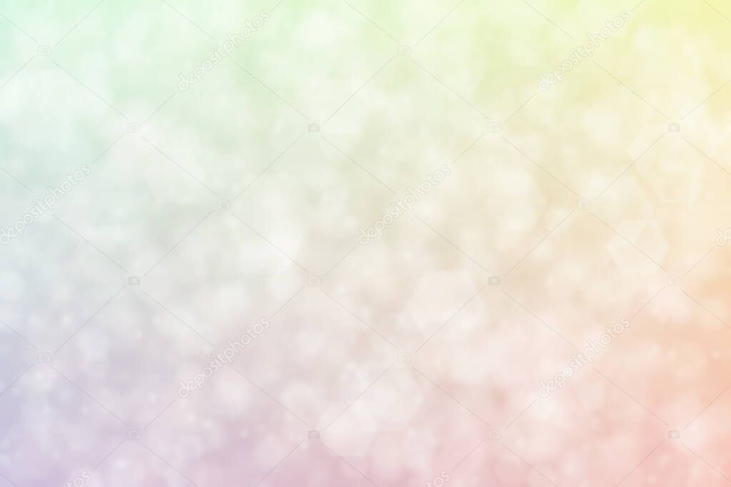 Light pink and sea foam green abstract background with bokeh.