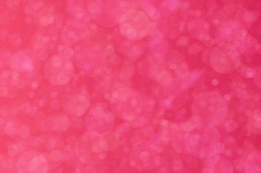 Çember şeklindeki bokeh benekleri ile odaklanmış pembe soyut arkaplan