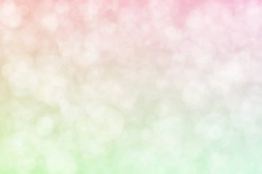 Açık pembe ve deniz köpüğü soyut yeşil soyut çözünmüş arka plan daire şeklindeki bokeh noktalarıyla