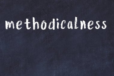 Üzerinde el yazısıyla yazılmış yazı tahtası olan kolej yazı tahtası