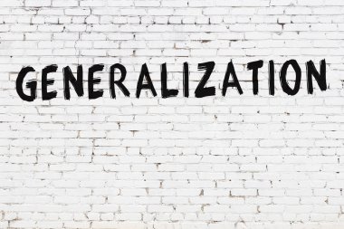 Siyah boyalı el yazısıyla yazılmış beyaz tuğla duvar.