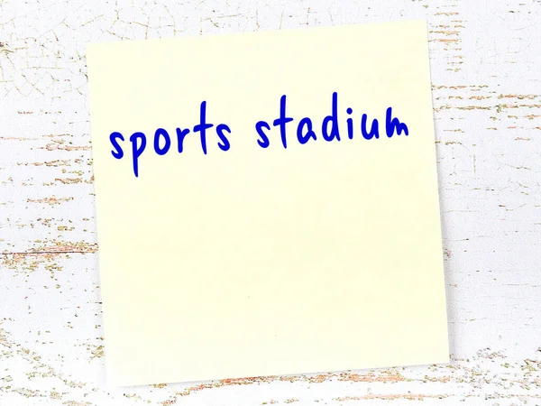 Yellow Sticky Note Wooden Wall Handwritten Inscription Sports Stadium — Stock Photo, Image