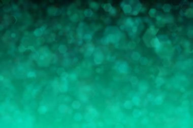 Bokeh ile soyut bir arkaplan. Yumuşak ışık odaklı noktalar.