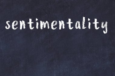 Üzerinde el yazısıyla yazılmış duygusallık olan üniversite yazı tahtası.