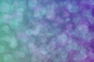 Bokeh ile soyut bir arkaplan. Yumuşak ışık odaklı noktalar.