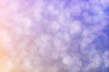 Çember şekilli bokeh noktalı pembe ve mor soyut odaklı arkaplan