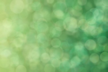 zeytin ve yeşil soyut odaklanmış arka plan daire şeklindeki bokeh noktalarıyla