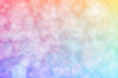 Pembe ve mavi soyutlanmış arka plan daire şeklindeki bokeh noktalarıyla