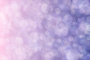 Bokeh ile soyut bir arkaplan. Yumuşak ışık odaklı noktalar.