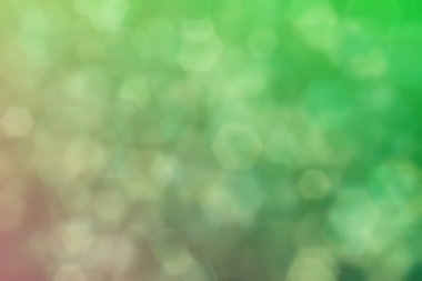 zeytin ve yeşil soyut odaklanmış arka plan, altıgen şekilli bokeh desen.