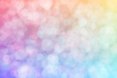 Pembe ve mavi soyutlanmış arka plan daire şeklindeki bokeh noktalarıyla