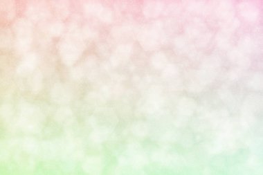Açık pembe ve deniz köpüğü. Soyut yeşil. Odaklanmış arka plan, altıgen şekilli bokeh noktaları.