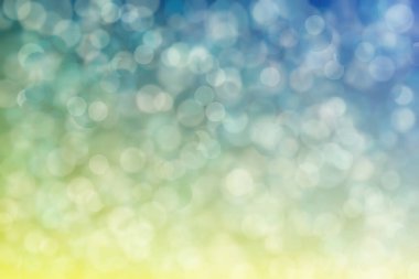 Bokeh ile soyut bir arkaplan. Yumuşak ışık odaklı noktalar.