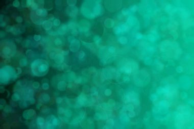 Bokeh ile soyut bir arkaplan. Yumuşak ışık odaklı noktalar.