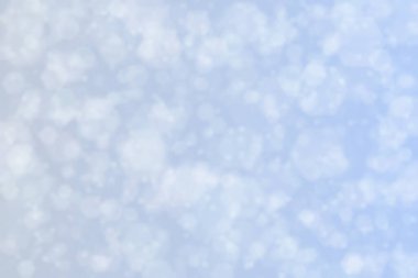 altıgen şekilli bokeh benekleri ile odaklanmış gri soyut arkaplan