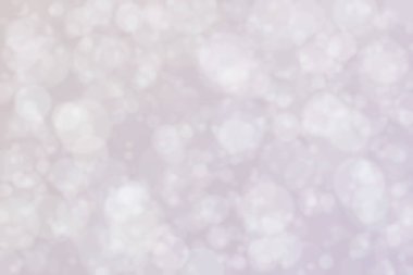 Çember şeklindeki bokeh noktalarıyla odaklanmış gri soyut arkaplan