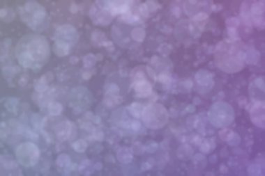 Bokeh ile soyut bir arkaplan. Yumuşak ışık odaklı noktalar.