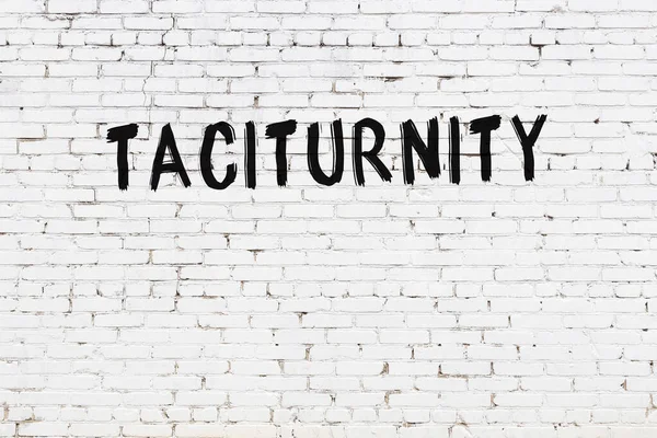 Inscription Taciturnity Written Black Paint White Brick Wall — Fotografia de Stock