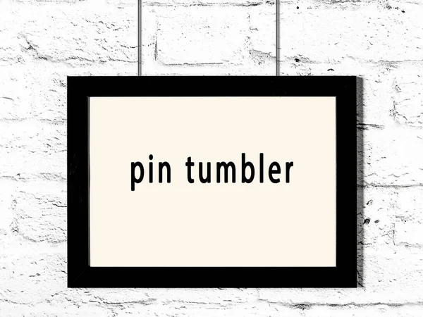 Black Wooden Frame Inscription Pin Tumbler Hanging White Brick Wall — Stock Photo, Image