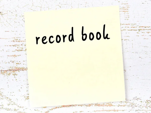 Yellow Sticky Note Wooden Wall Handwritten Inscription Record Book — 图库照片