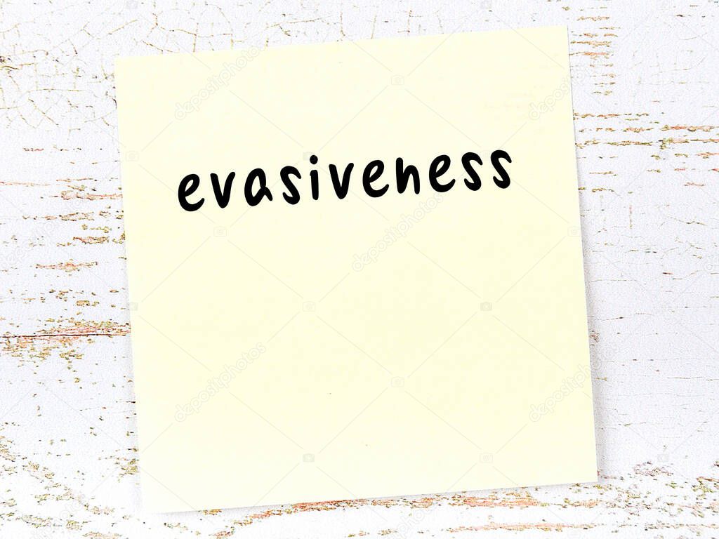 Concept of reminder about evasiveness. Yellow sticky sheet of paper on wooden wall with inscription