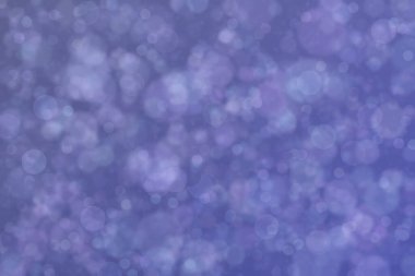 Bokeh ile soyut bir arkaplan. Yumuşak ışık odaklı noktalar.