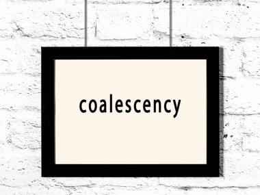 Black wooden frame with inscription coalescency hanging on white brick wall 