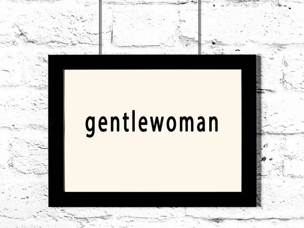Black Wooden Frame Inscription Gentlewoman Hanging White Brick Wall — Photo