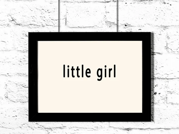 Black Wooden Frame Inscription Little Girl Hanging White Brick Wall — 图库照片