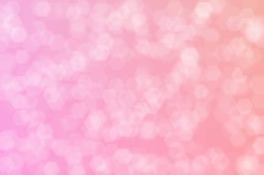 Altıgen şekilli bokeh noktalı pembe soyut odaklanmış arkaplan