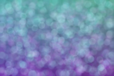 Mor ve yeşil arkaplanda daire şeklinde benekleri olan harmonik güzel astrakt arkaplan.