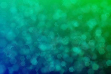 Nane yeşili ve koyu yeşil soyut çözünmüş arkaplan ve altıgen şekilli bokeh lekeleri