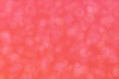Altıgen şekilli bokeh noktalı pembe soyut odaklanmış arkaplan