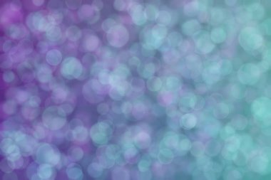 Bokeh ile soyut bir arkaplan. Yumuşak ışık odaklı noktalar.