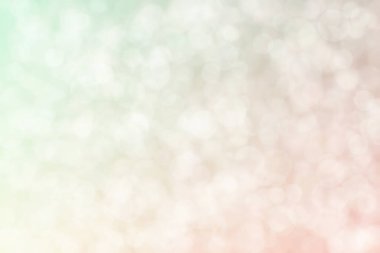 Açık pembe ve deniz köpüğü soyut yeşil soyut çözünmüş arka plan daire şeklindeki bokeh noktalarıyla