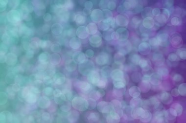 Bokeh ile soyut bir arkaplan. Yumuşak ışık odaklı noktalar.