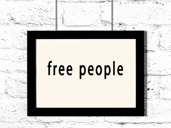 Black Wooden Frame Inscription Free People Hanging White Brick Wall — Stock Photo, Image