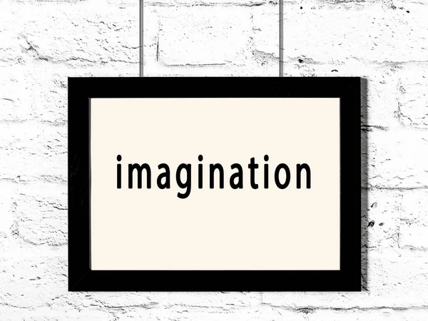 Černý Dřevěný Rám Nápisem Představivost Visí Bílé Cihlové Zdi — Stock fotografie
