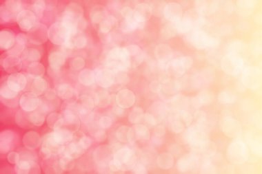 Çember şeklinde bokeh ile şeftali rengi arkaplan. Pembeden bej gradyana.