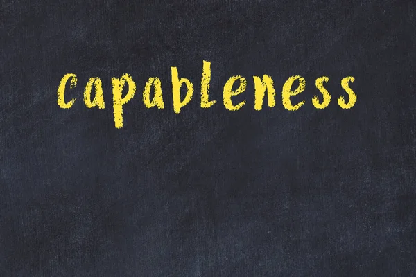 Üzerinde el yazısıyla yazılmış yazı tahtası olan kolej tahtası.