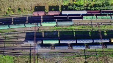 Railway cargo station junction with lot of trains and track lines