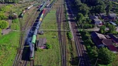 Railway Station with lots of Lines and Freight Trains. Aerial View