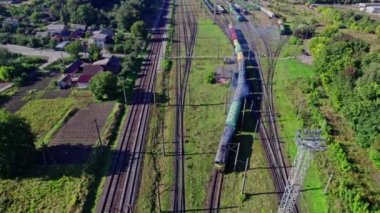 Railway cargo station junction with lot of trains and track lines