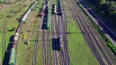 Railway cargo station junction with lot of trains and track lines