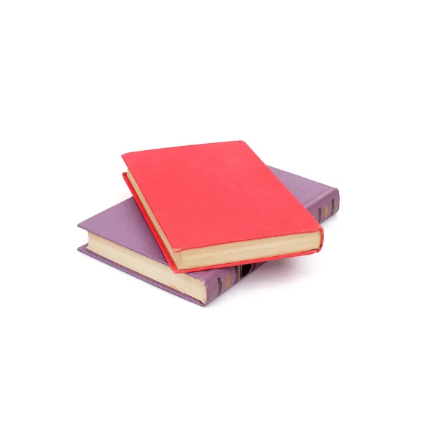 红色和紫色的书在白色背景上隔离开来 — 图库照片