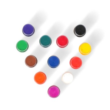Acrylic colors isolated on a white background in the form of a heart