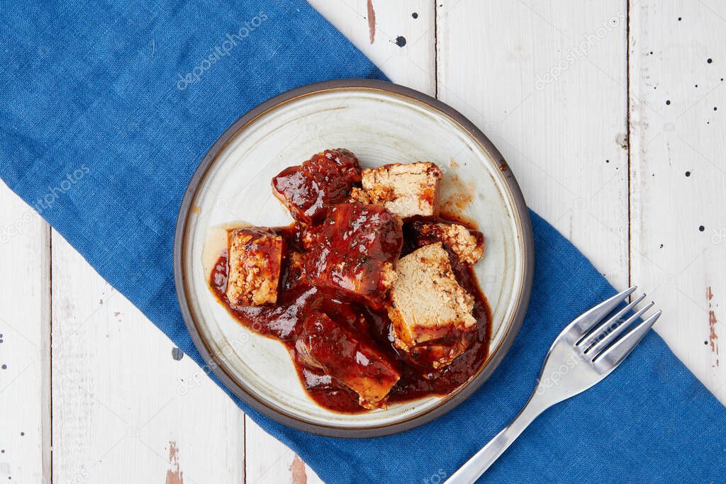 Tofu meat with tomato sauce on plate